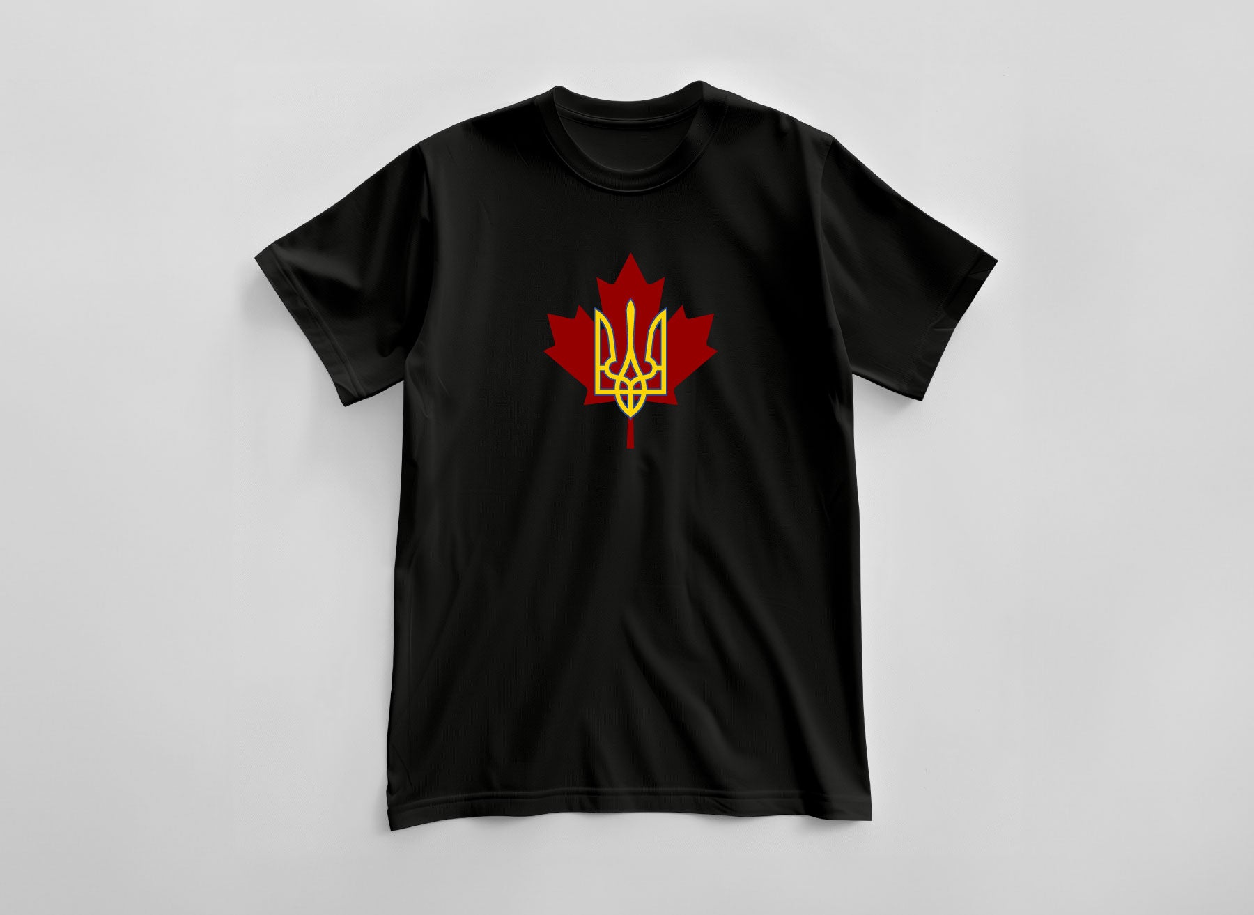 black T-shirt with a large print of the coat of arms of Ukraine on a maple leaf background by Azure and Gold